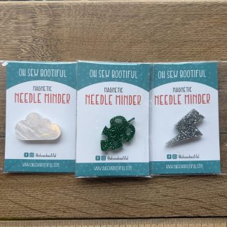 Needle Minders